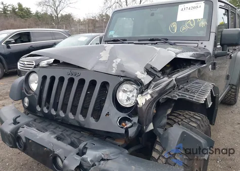 2014 Jeep Wrangler Unlimited Willys Wheeler z USA, uszkodzony, nr VIN 1C4BJWDG2EL299027